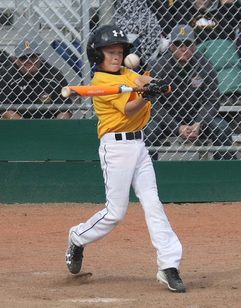 Granada Little League celebrated its 50th Anniversary on Opening Day Saturday, March 5th.  Shown is Christian Clouser getting a base hit to right field knocking in 2 runs in a Majors game between the