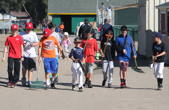 Saturday was Field Day at Granada Little League as Spring Training was wrapping up.  Shown are a group of youth with rakes, brooms, and shovels about to go to work on Field 3.  Either that, or they we