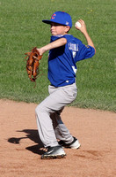 Vinny Carbonaro make the throw to first, after fielding a ground ball at second base for the Cubs in a Granada Little League Major’s game.
